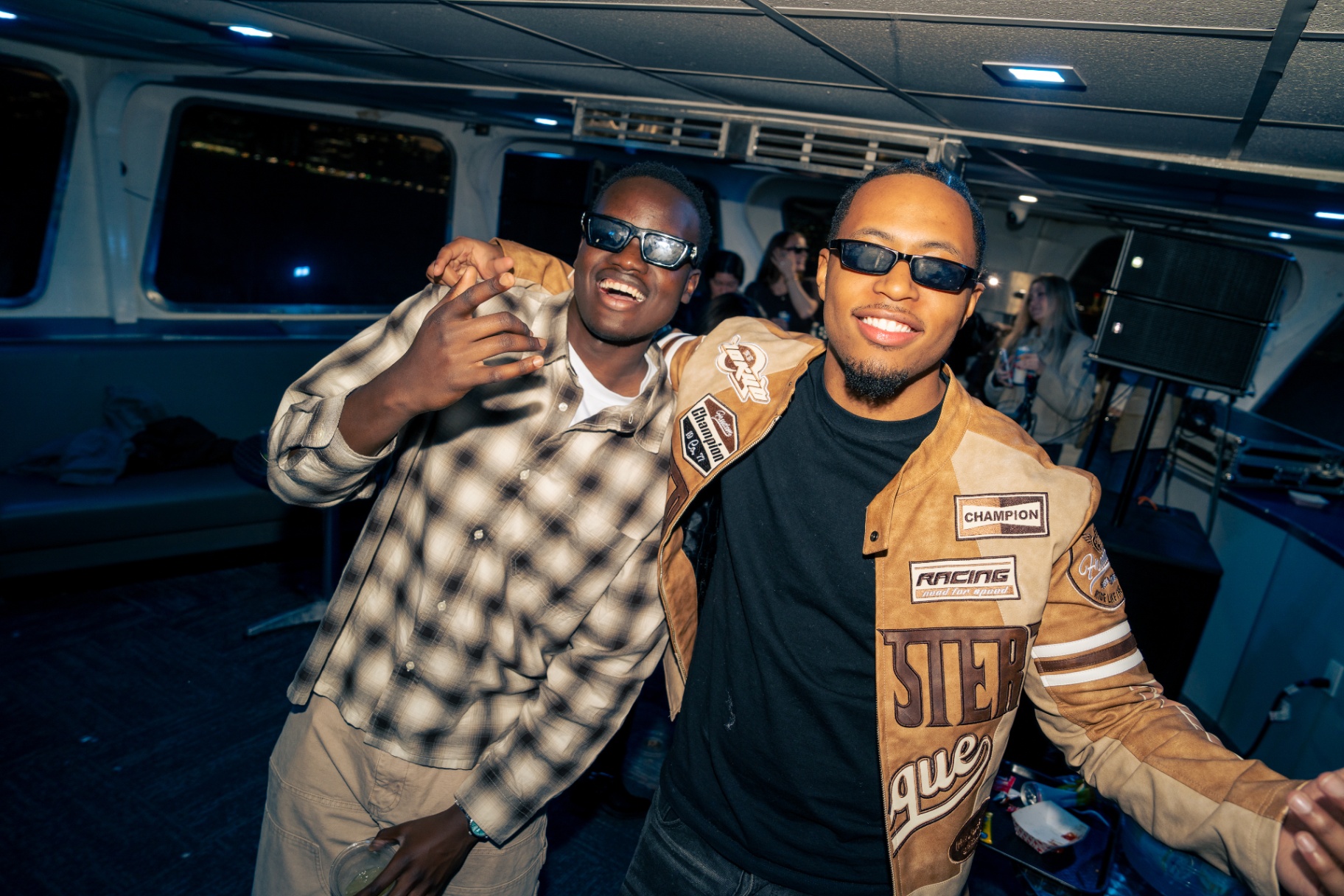 Friends in shades partying on the boat
